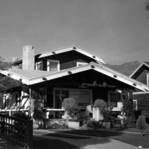 An old black and white photo of a house.