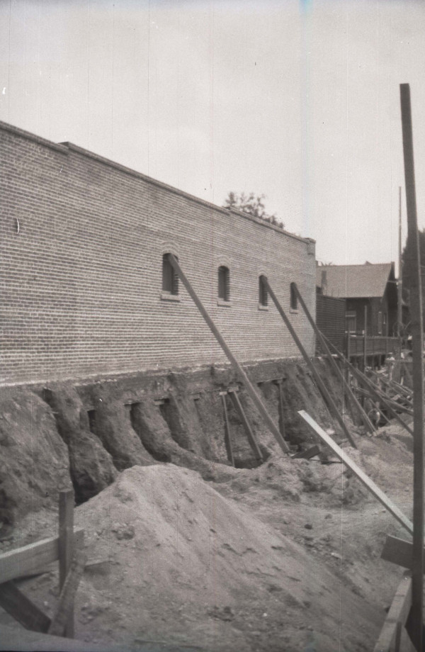 Looking southeast from East Colorado Street toward Eva Fényes' property, the western façade of her stores and one of the bungalows behind the stores, 29 April 1912. (Fényes Collection, FCP.40.2, p.130)