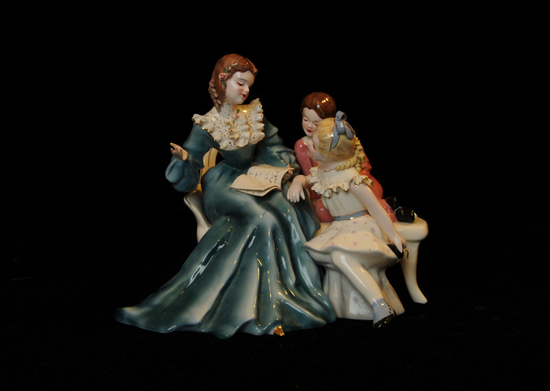 Figurine, Story Book Hour. Marked: Story Book Hour/Florence Ceramics/Pasadena/ California/©. 6.75 in high, 8.5 in wide (Gift of Doug Foland, 2010.008.023)