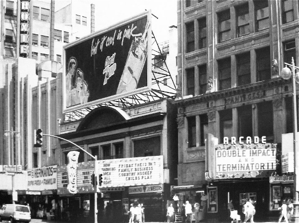 View of the Roxie, Cameo and Arcade theaters on Broadway in Los Angeles, c. 1991. Accessed at https://sites.google.com/site/downtownlosangelestheatres/arcade