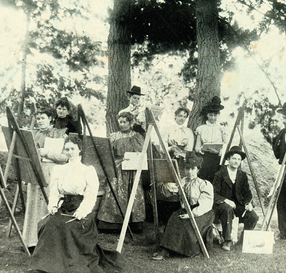 a group of people painting