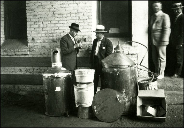 two men in a speakeasy raid