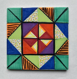 Example of geometric tile design made during Art 2 Go’s ceramic tile workshop